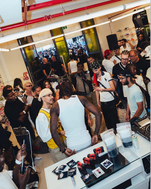 DJ playing music at a Kolab store event