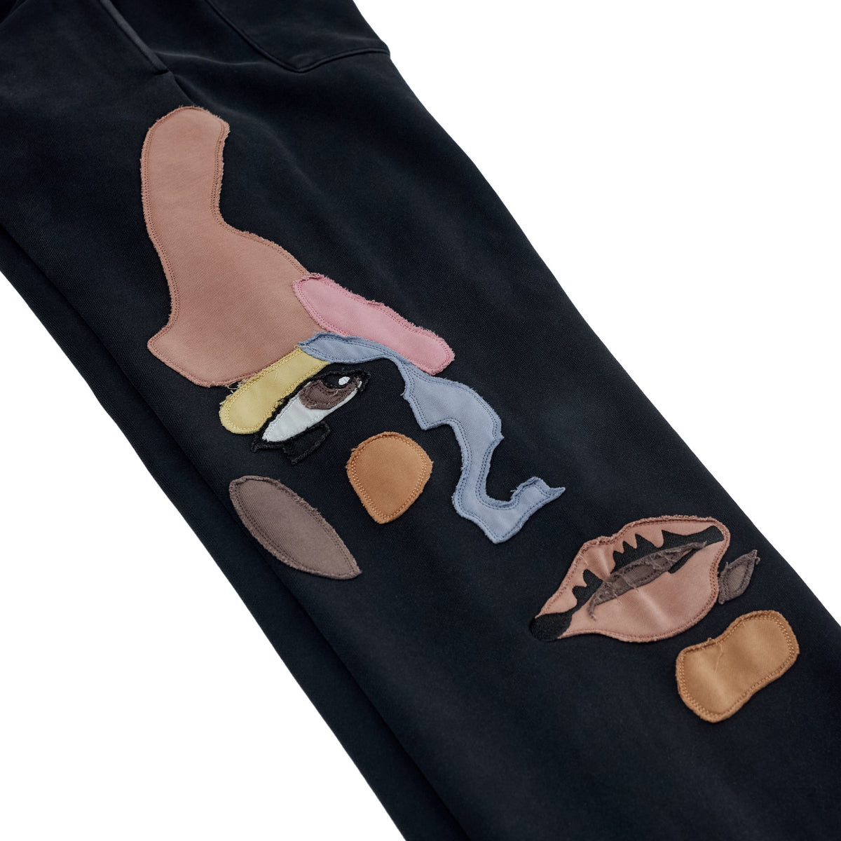 Side Eye Face Sweats Black